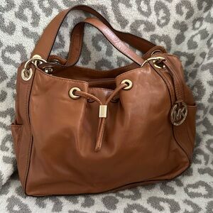Michael Kor’s soft tan leather bag